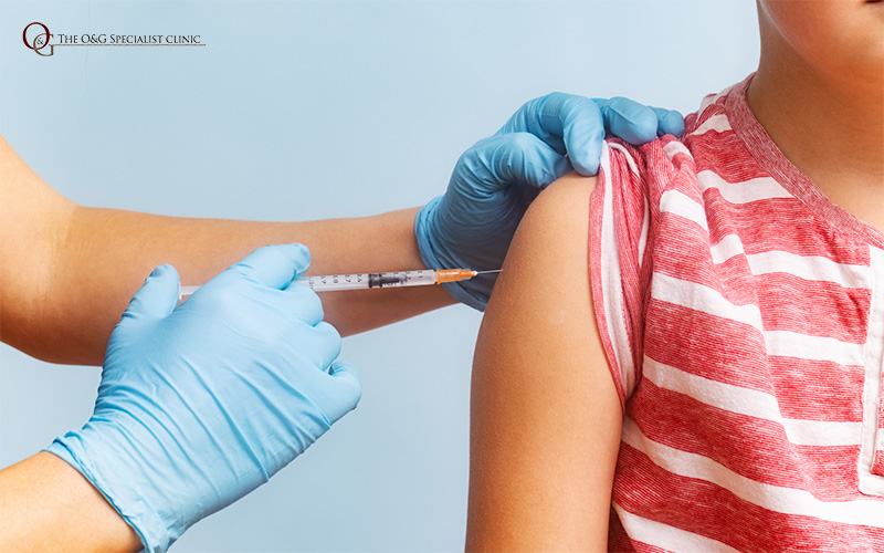 Pediatrician Injecting Vaccine