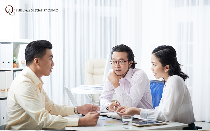 Couple consulting with a professional.