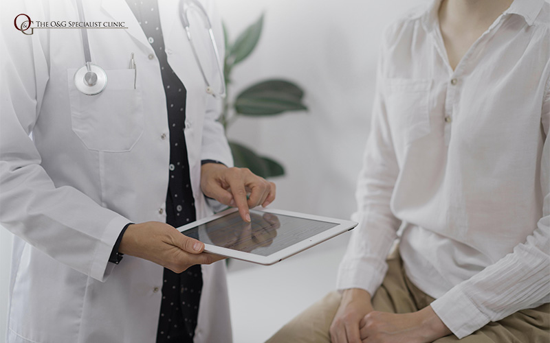 Doctor discussing endometriosis treatment with patient.