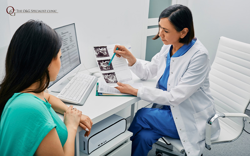 Doctor reviewing a patient's ultrasound image.